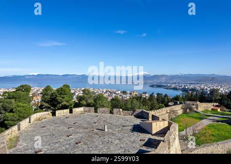 Chalkida town: aerial panoramic view from Karampampa Castle, featuring the Euripus Channel and the snow-covered summit of Mount Dirfys at the back. Stock Photo