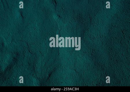 A richly textured teal, green surface with organic, wavy patterns offering a natural aesthetic. Useful for backgrounds or design elements emphasizing Stock Photo