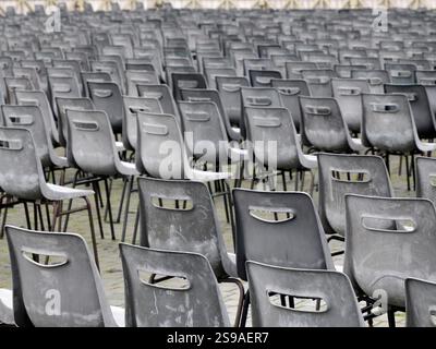 many attendance chairs seats empty detail Stock Photo