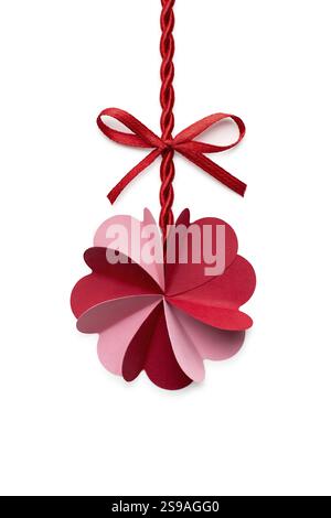 Creative valentines concept photo of a flower made of paper hearts with a rope and a bow on a white background Stock Photo