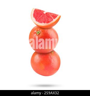 Fresh grapefruits in air on white background Stock Photo