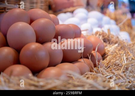 White eggs waiting to be colored on a blue cloth Stock Photo - Alamy