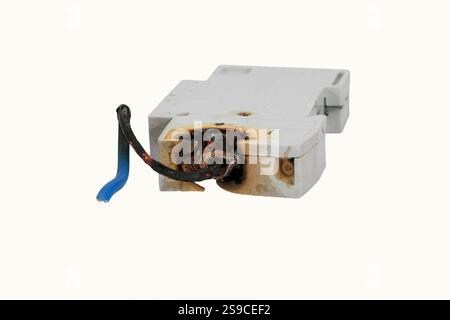 Burned electrical circuit breaker, fuse box on white background.  The burned cable Stock Photo