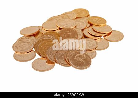 Stacks of Turkish gold coins, isolated on a white background (Ata lira) Stock Photo