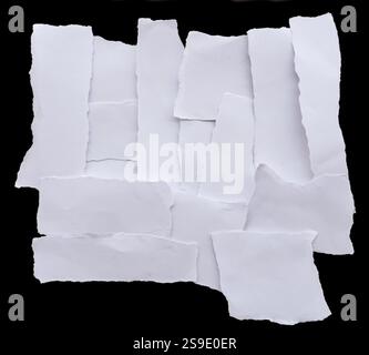 Torn papers on black background Stock Photo
