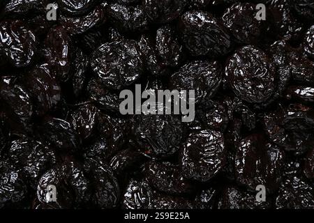 Texture of dried prunes as background Stock Photo