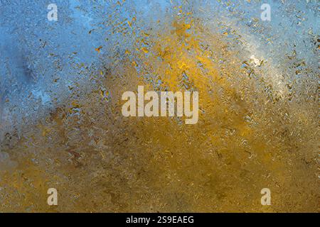 multi-colored abstract background of wet glass wave patterns Stock Photo