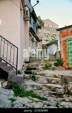 Concrete staircase in city park, staircase on green grass background in summer afternoon Stock Photo