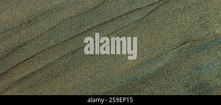 Elegant Abstract Texture with Subtle Green and Gold Tones Featuring Smooth Flowing Lines and Shimmering Finish Stock Photo