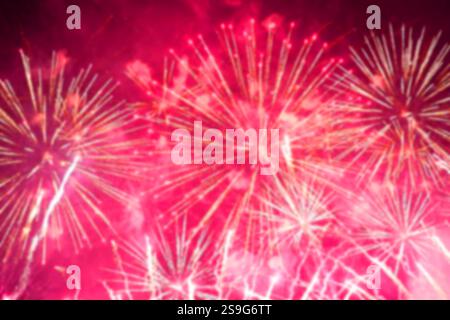 Fireworks on the dark sky background. Colorful fireworks blur softness out of focus. Stock Photo