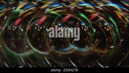 Color bubbles. Blur flare. Red blue green lens sparkling reflection gleaming flicker ribbons on abstract art bokeh dark background. Stock Photo