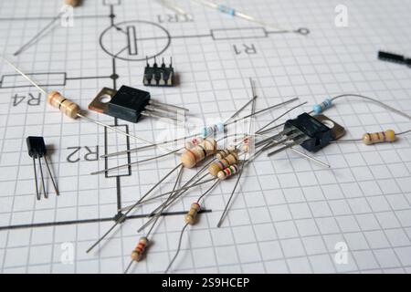 Electronic components on electronic circuit diagram. Electric or electronic projects concept. Focused on resistors. Stock Photo