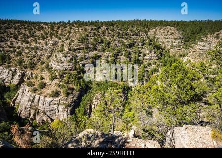 View from the Island Trail at Walnut Canyon National Monument. The Island Trail drops down 240 concrete steps into the depths of Walnut Canyon, where Stock Photo