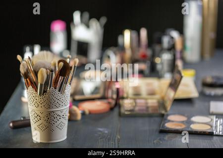 Cosmetic accessories for applying makeup closeup on the table. Stock Photo