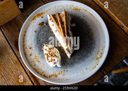 Delicious cake served on a plate at a restaurant Stock Photo