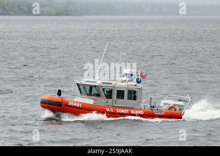 A US Coast Guard vessel patrols on Lake Superior during the Tall Ships Festival - Duluth, Minnesota. Stock Photo