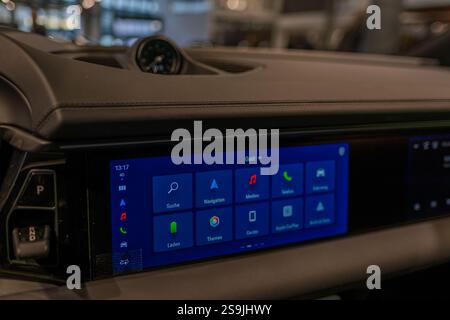 luxurious interior electric Porsche Macan GTS car Interior, cockpit, instruments button switches, electric vehicle, modern interface, digital innovati Stock Photo
