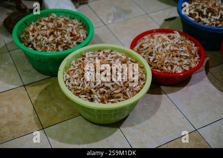 Bowls of shredded chicken, ready for cooking. Stock Photo