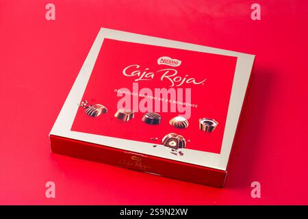 Nestle chocolate red box isolated on red background Stock Photo