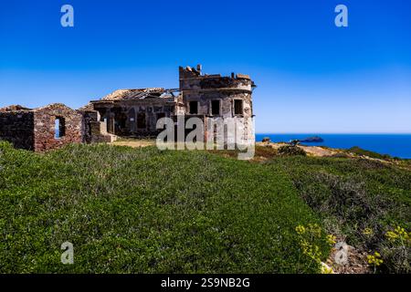Ruins of Ex semaforo di Capo Sperone, an old lighthouse on the southern tip of the Isola di Sant'Antioco island, built in 1887. Stock Photo
