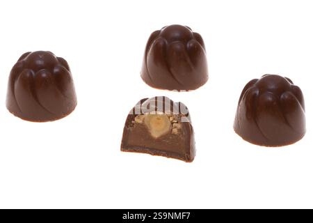 chocolate candies with hazelnuts isolated on white background Stock Photo