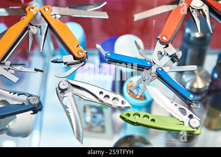 Folding knives multi-tool in store Stock Photo