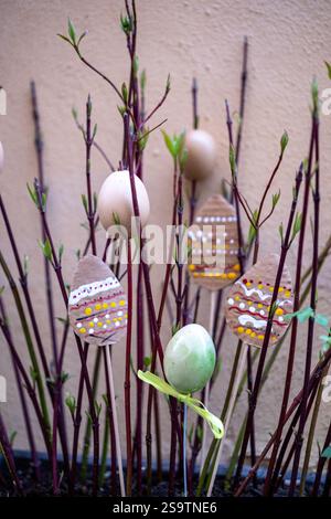 Easter Egg Decorations on Budding Branches Stock Photo