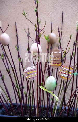 Easter Egg Decorations on Budding Branches Stock Photo