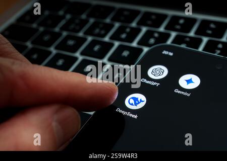 DeepSeek AI, Gemini. ChatGPT AI apps seen on the smartphone and finger is about to launch it. Stafford, United Kingdom, January 26, 2025 Stock Photo