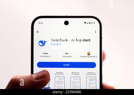DeepSeek AI app Install button seen on the Pixel 9 Pro smartphone hold in a hand. Stafford, United Kingdom, January 26, 2025 Stock Photo