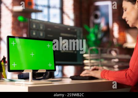 Female freelancer interacting with an AI chatbot next to isolated copy space, smart web software showcases cutting edge artificial intelligence for efficient real time solutions and problem solving. Stock Photo