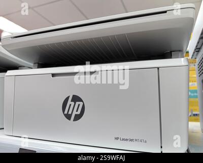 Bobruisk, Belarus - 26 January 2025: A sleek laser printer rests on display in a contemporary office. Stock Photo
