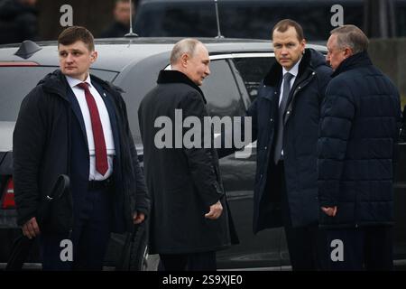 St. Petersburg, Russia. 27th Jan, 2025. Russian President Vladimir Putin (left) and St. Petersburg Governor Alexander Beglov (right) seen during the solemn mourning ceremony of laying flowers and wreaths at the 'Mother Motherland' monument at the Piskarevskoye Memorial Cemetery. St. Petersburg celebrates an important historical date, 81 years since the complete liberation of Leningrad from the fascist blockade. Credit: SOPA Images Limited/Alamy Live News Stock Photo