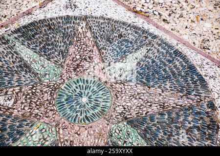 Greece. Mosaic star design pebbles on floor Stock Photo
