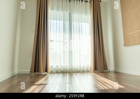 Curtain window interior decoration in living room on sunny day with sunlight Stock Photo