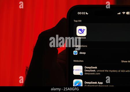 Paris, France - Jan 28, 2025: Smartphone screen showing DeepSeek app as the top search result with suggestions and related websites displayed as Red b Stock Photo