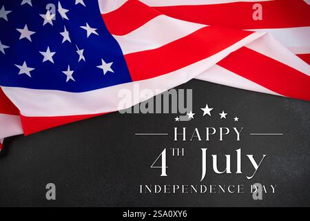 Independence Day Card - Usa Flag With Sparkler On Black color Stone And Abstract Bokeh - 4th July Text. Stock Photo