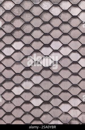 Grey concrete hexagonal pavement creating repeating pattern Stock Photo