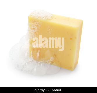Yellow soap with foam on white background Stock Photo