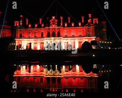 Floodlight Waddesdon Manor reflected in the water Stock Photo