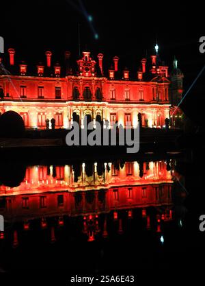 Floodlight Waddesdon Manor reflected in the water Stock Photo