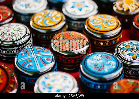 Wooden colorful round boxes souvenirs at asian market in Myanmar Stock Photo