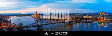 Evening view panorama of Parliament and Chain bridge in beautiful town of Budapest Stock Photo