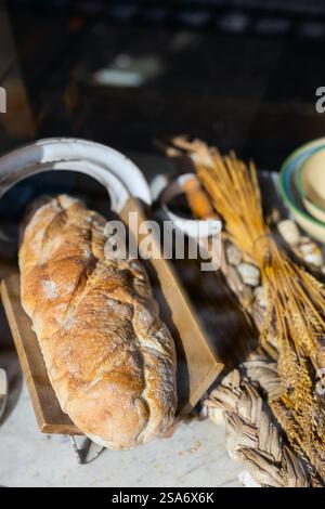 Loaf of sourdough bread on a rustic background Stock Photo