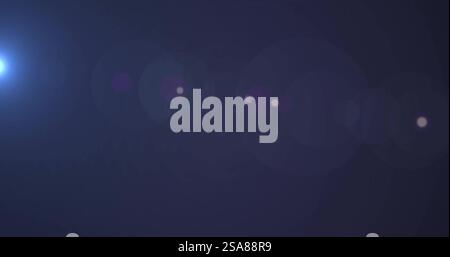 Image of glowing light spots moving over blue background Stock Photo
