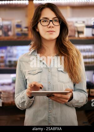 Barista, tablet and thinking for small business, coffee shop and startup inventory check with online sales. Woman, checklist and digital website for Stock Photo