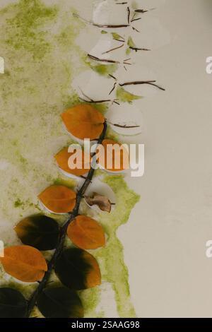 A vine of yellow and green leaves stuck to a ceiling. Stock Photo
