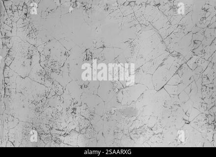 White paint peeling off of the wall.  Old coating, rotting. Corrosive material eating iron steel. Oxidized steel iron. Stock Photo