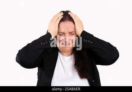 Beautiful business woman wearing black suit over isolated white background suffering from headache desperate and stressed because of pain and migraine Stock Photo
