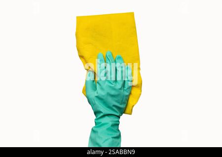 Closeup hand with green gloves holding yellow duster microfiber cloth for cleaning isolated on white background with clipping path. Stock Photo